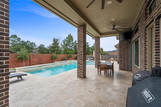 view of swimming pool with a fenced backyard, a fenced in pool, and a patio