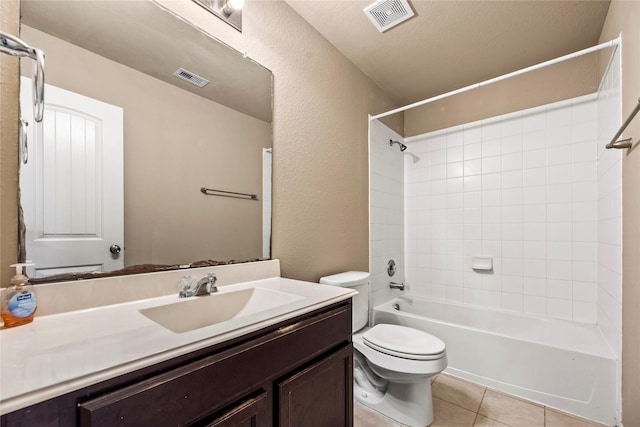 full bathroom with toilet, vanity, visible vents, and tile patterned floors