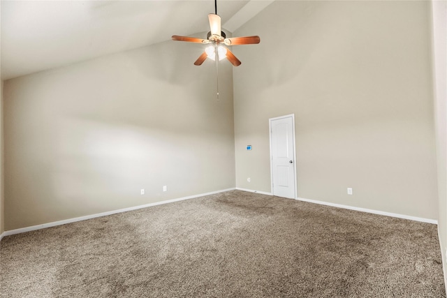 carpeted spare room with high vaulted ceiling, a ceiling fan, and baseboards