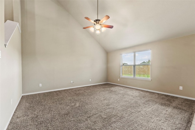 carpeted empty room featuring baseboards, high vaulted ceiling, and a ceiling fan