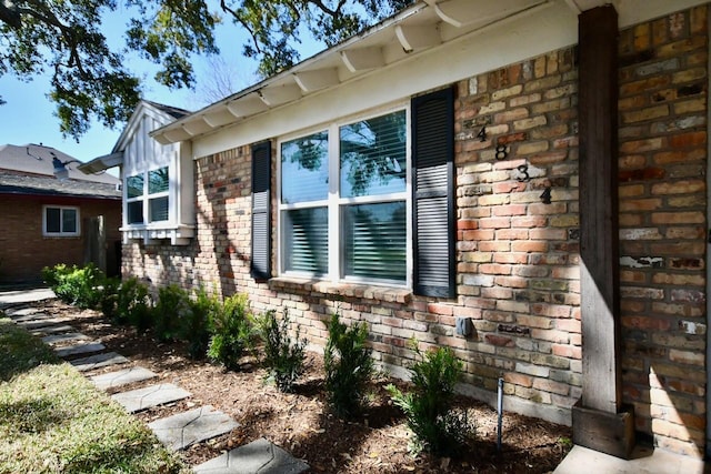 view of home's exterior featuring brick siding