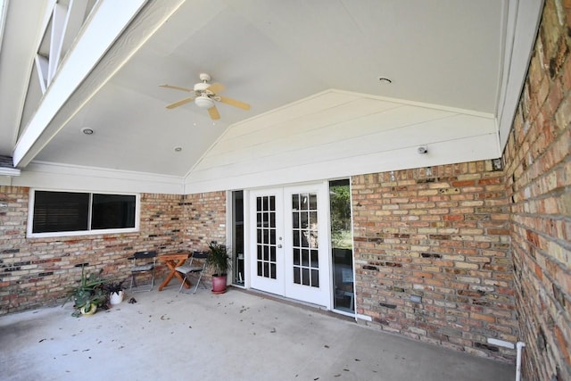 view of patio / terrace featuring a ceiling fan and french doors