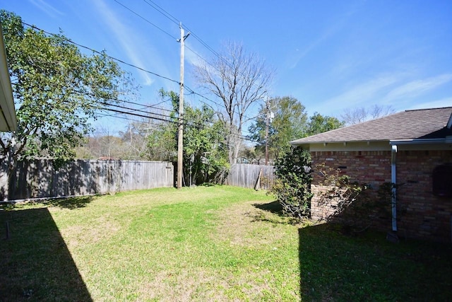 view of yard featuring fence