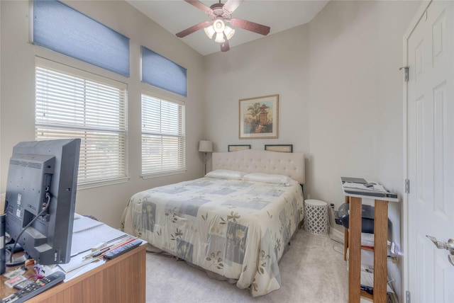 bedroom with light colored carpet