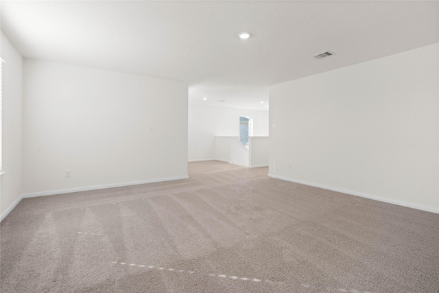 8110 Shelter Bay Ln, Cypress, TX 77433 - empty room with recessed lighting and light carpet