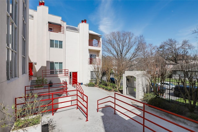 exterior space with a gate and fence