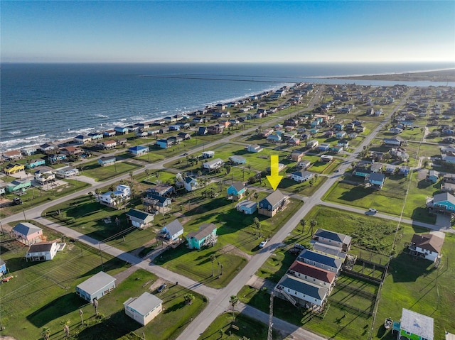 drone / aerial view with a residential view and a water view