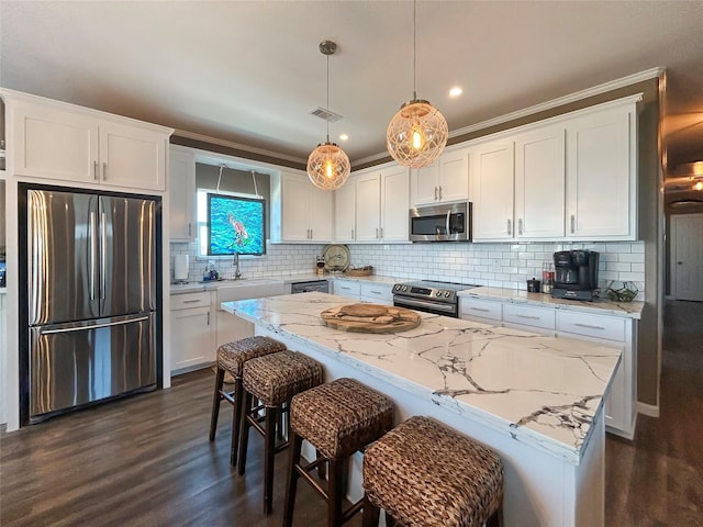 kitchen featuring white cabinetry, visible vents, appliances with stainless steel finishes, and dark wood-style flooring