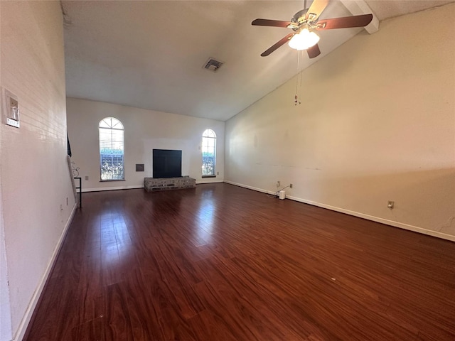 unfurnished living room with baseboards, visible vents, dark wood finished floors, a brick fireplace, and high vaulted ceiling