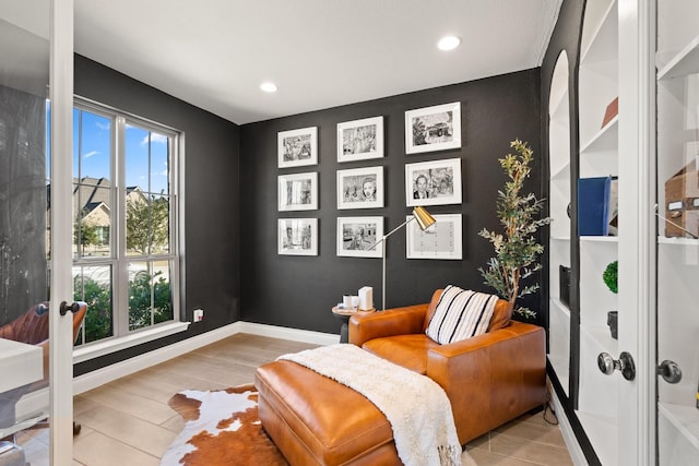 living area with french doors, recessed lighting, wood finished floors, and baseboards