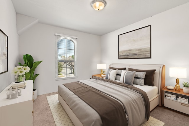 bedroom with light colored carpet