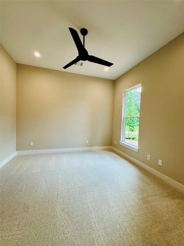 212 Rim Rock Rd, Huntsville, TX 77340 - carpeted empty room with ceiling fan, baseboards, and recessed lighting