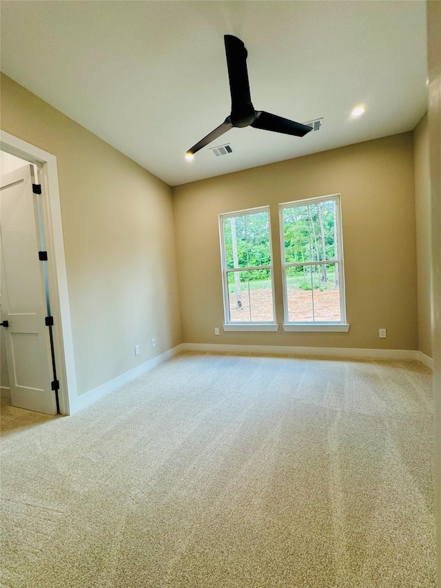212 Rim Rock Rd, Huntsville, TX 77340 - carpeted empty room with a ceiling fan and baseboards