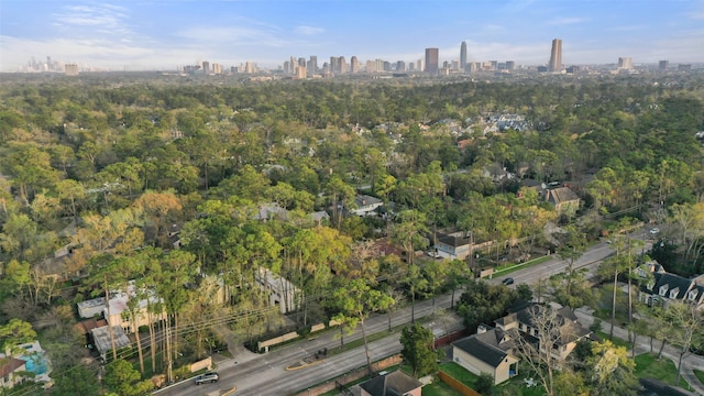 birds eye view of property with a city view