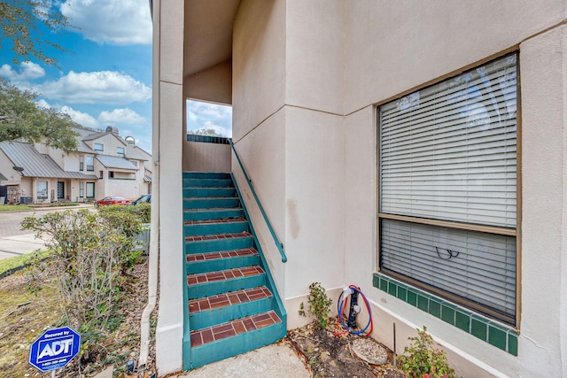 staircase with a residential view