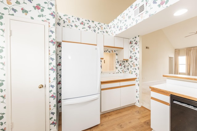 full bathroom with wallpapered walls, visible vents, wood finished floors, vaulted ceiling, and vanity