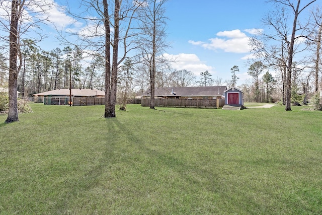 view of yard with entry steps and fence