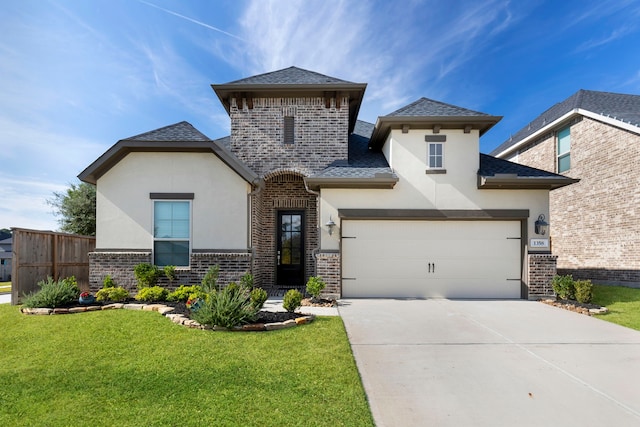 view of front of property with a front yard, a garage, brick siding, and concrete driveway