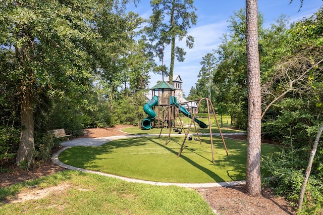 community play area featuring a lawn