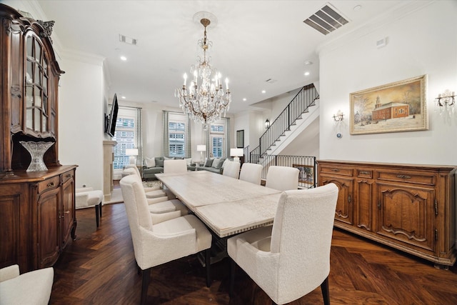 dining space featuring stairs, ornamental molding, and visible vents