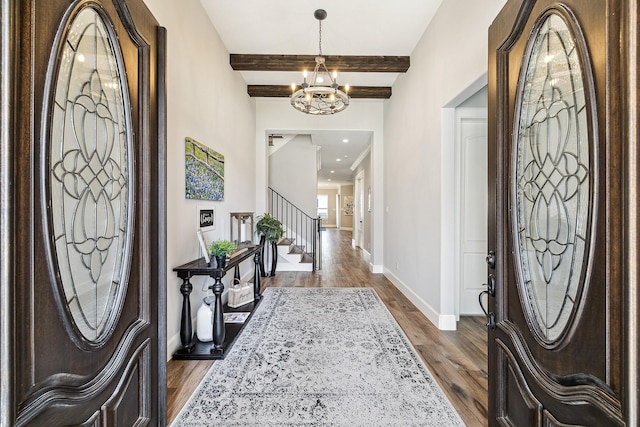 entryway with stairway, baseboards, dark wood-style flooring, beamed ceiling, and a chandelier