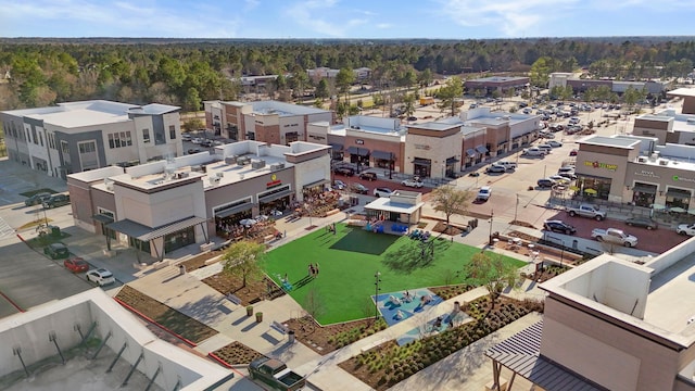 birds eye view of property with a forest view