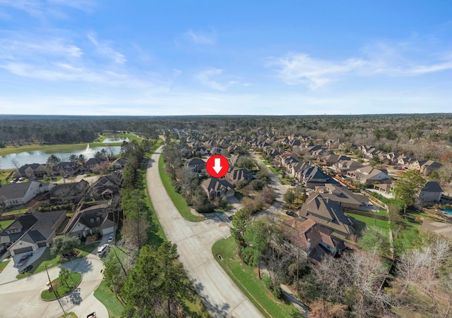 aerial view with a water view and a residential view