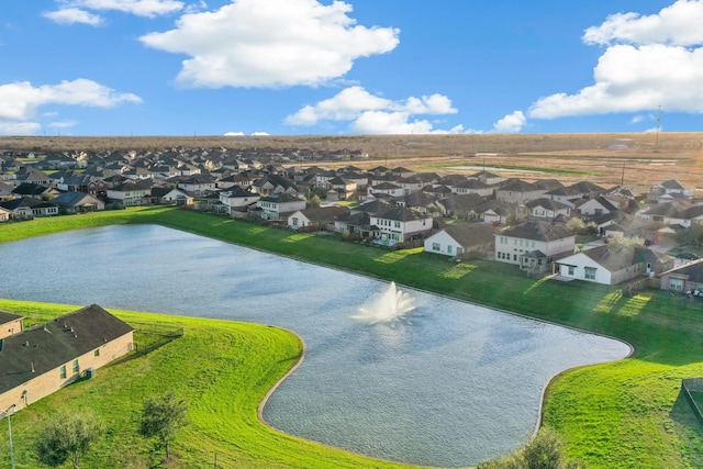 aerial view featuring a water view and a residential view