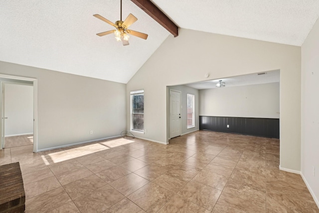 spare room featuring ceiling fan, high vaulted ceiling, a textured ceiling, baseboards, and beamed ceiling