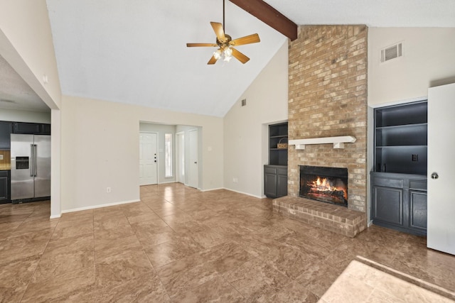 unfurnished living room with a brick fireplace, beam ceiling, visible vents, and baseboards