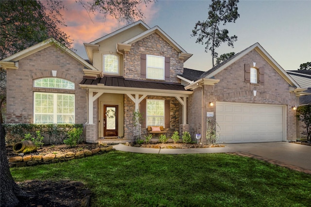 view of front of house featuring a front lawn, covered porch, metal roof, driveway, and a standing seam roof