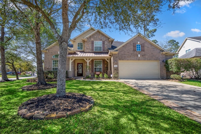 traditional-style house featuring brick siding, a standing seam roof, concrete driveway, and a front yard