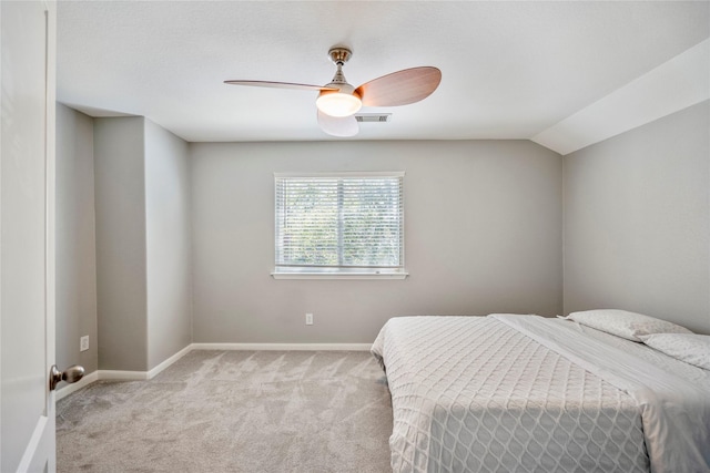 bedroom with visible vents, baseboards, carpet floors, and ceiling fan