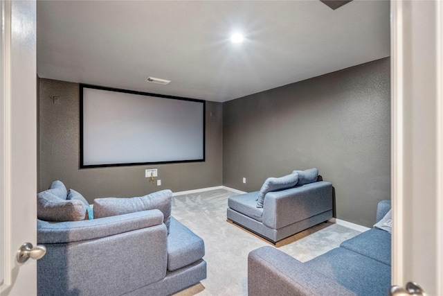 home theater with visible vents, carpet floors, and baseboards