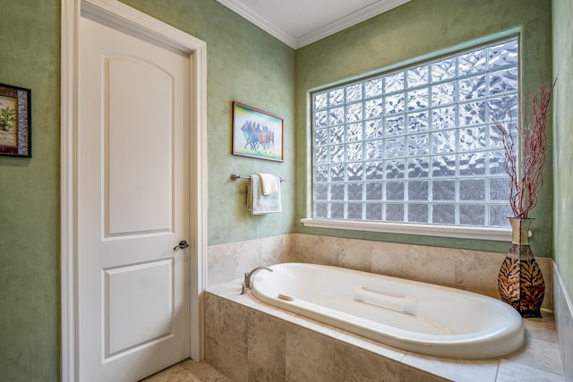 full bathroom with a garden tub and crown molding