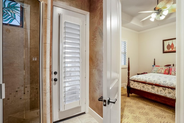 bedroom featuring light tile patterned floors, ceiling fan, ornamental molding, and baseboards