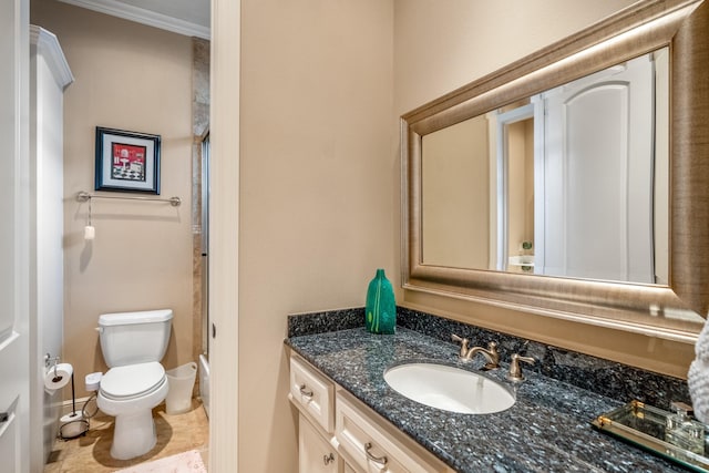 full bathroom featuring vanity, toilet, and crown molding