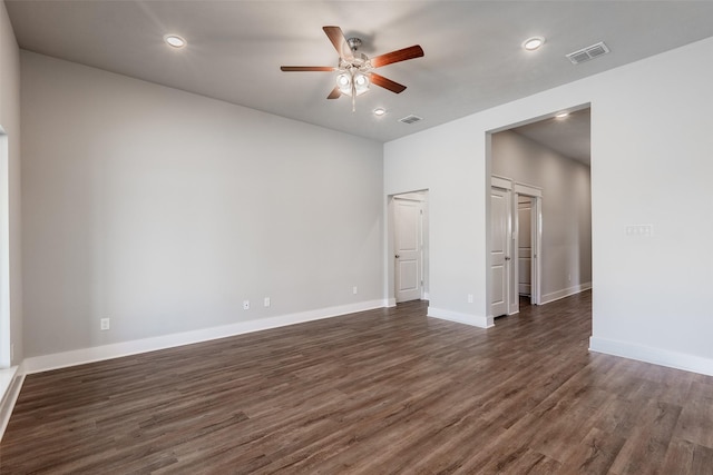 unfurnished bedroom with dark wood-type flooring, recessed lighting, visible vents, and baseboards