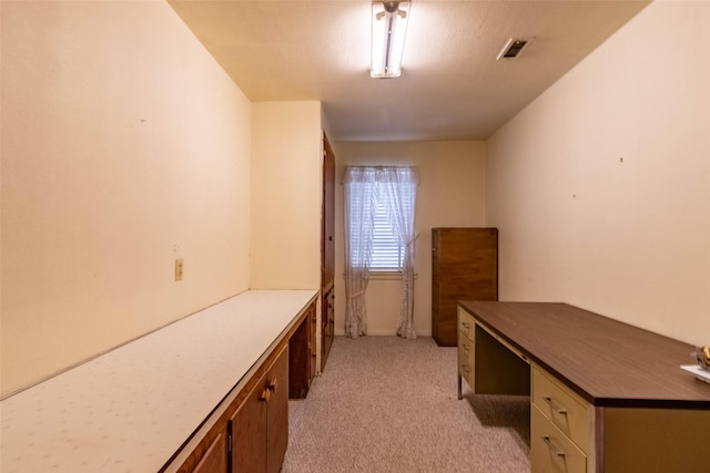 home office featuring visible vents and light colored carpet