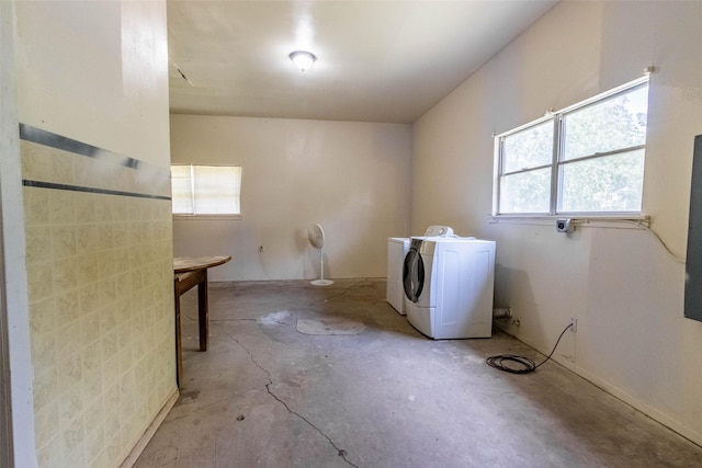 laundry area with laundry area and independent washer and dryer