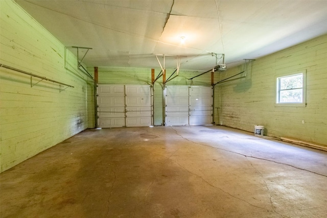 parking deck featuring a garage door opener