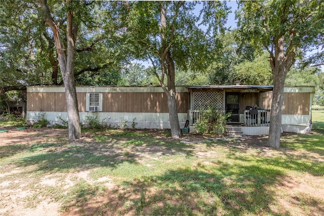 view of front of home with a front yard