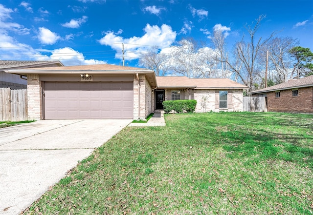 ranch-style house featuring brick siding, an attached garage, fence, driveway, and a front lawn