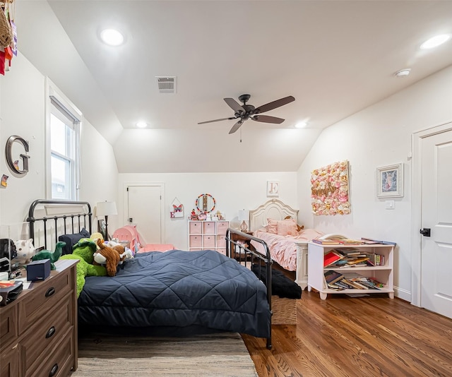 bedroom featuring visible vents, vaulted ceiling, recessed lighting, wood finished floors, and a ceiling fan