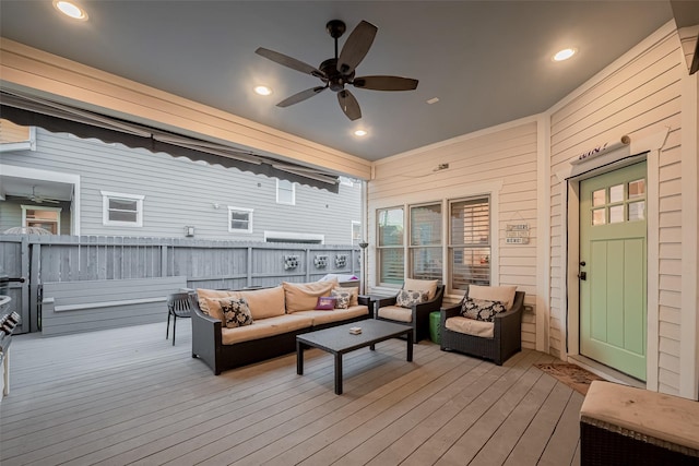 deck featuring a ceiling fan and an outdoor hangout area