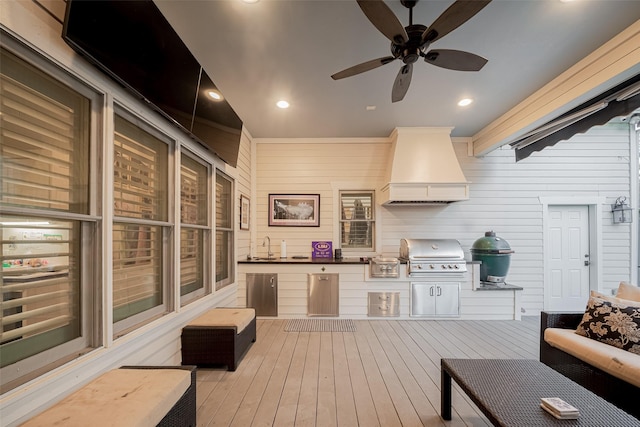 interior space featuring area for grilling and ceiling fan