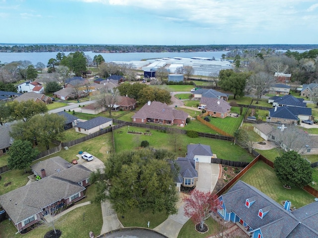 aerial view with a residential view and a water view