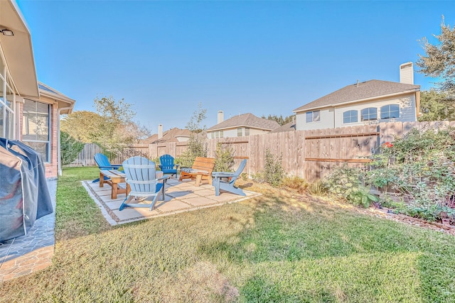 view of yard featuring a fenced backyard and a patio