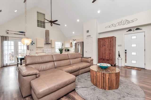 living room featuring french doors, recessed lighting, a ceiling fan, wood finished floors, and high vaulted ceiling