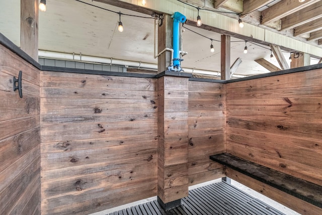 interior space featuring wood walls